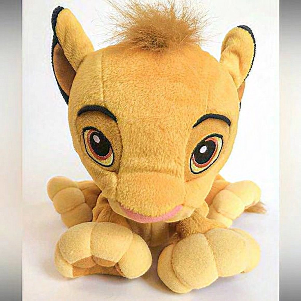 The Lion King Paw‎ 'n Play Simba Pet Simba's back to make him talk & moves paws.
